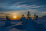 Solnedgang og perlemorskyer