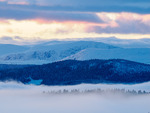Vintertåke ved solnedgang